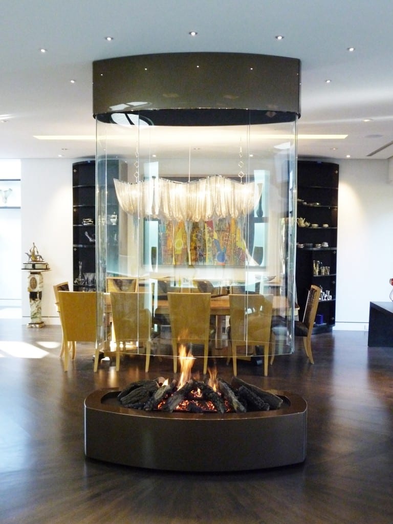 Hanging fireplaces look spectacular and will transform your architectural interior, bringing elegance, character and style, as well as more light and transparency when free hanging fireplaces are in glass. Suspended fireplaces designs are minimalist, adding a creative and stunning accent to contemporary interior. Our hanging fireplaces will become a centrepiece in your home, a fire sculpture adding personality to your interior design and decor. Hanging fireplaces can function with wood, gas or ethanol and be open, closed, two sided, rotating, etc. Suspended fireplaces can be located in the center of a room, between two rooms, in a corner, or outside under a patio.